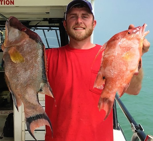 Captain Joe Drew showing off some of the beautiful fish from his recent HUB private charter at Hubbard's Marina