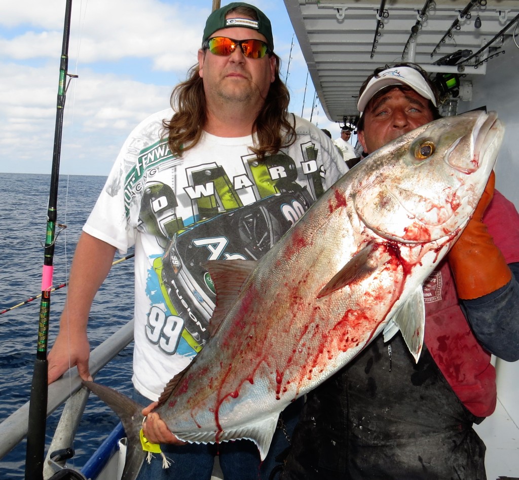 Left-Right- John Lehman from Bloomington Illinois and Ritchie Gollis our 2nd mate showing off John's Big Amberjack from the 39 hour at Hubbard's Marina