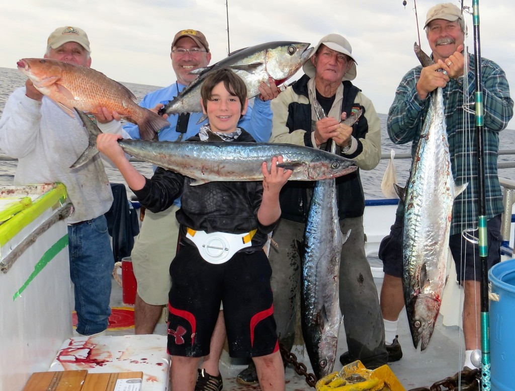 Left-Right- Larry Miller, Eric Geller, Eric's son Max Geller, Jig head ed sumrall, and ed's cousin Dan Jackman - all showing off mangrove snapper, tuna and kingfish from our 39 hour