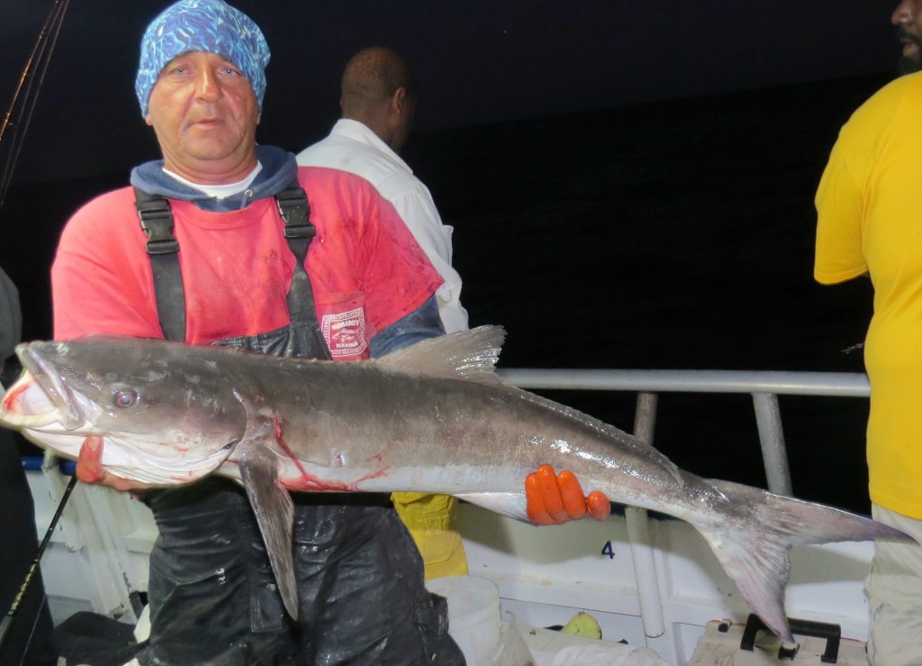 Ritchie Gollis showing off a big cobia from the 39 hour dee sea fishing trip at Hubbard's Marina