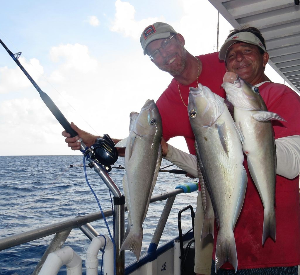Left-Right Captain Mark Hubbard and Ritchie Gollis showing off four of the many tilefish we caught on the 63 hour at Hubbard's Marina
