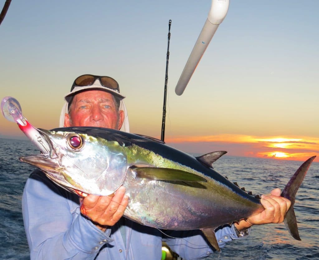 Jig Head Ed Sumrall showing off a nice blackfin Tuna caught while trolling at Hubbard's Marina