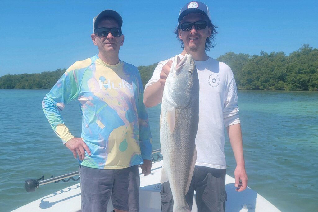 INSHORE - redfish - submitted by Capt dave Markett - Barry Hodkiweitz with a 32inch redfish